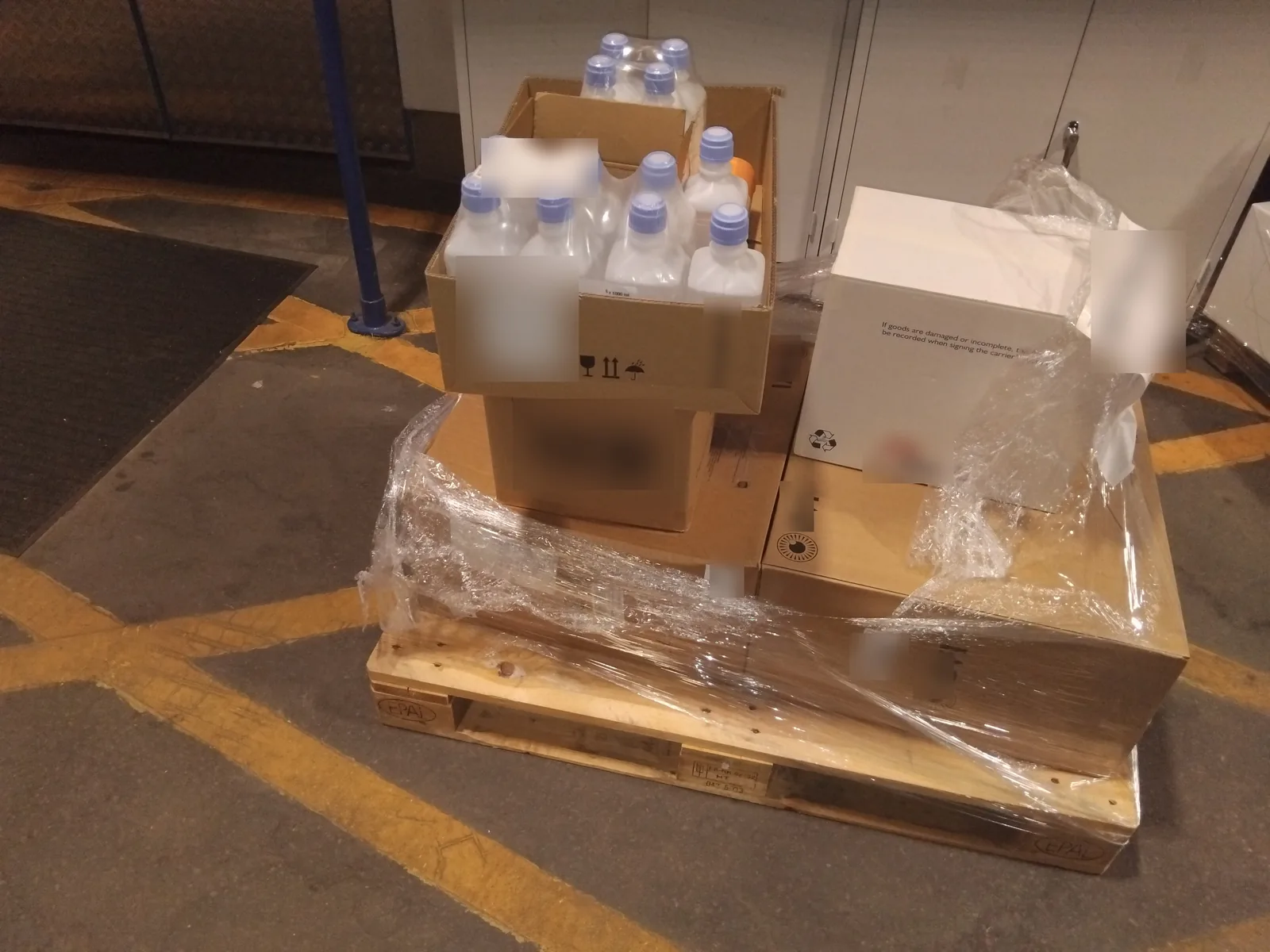 Pallet of boxed medical supplies and lab consumables prepared for Red Eagle Logistics same-day pallet delivery